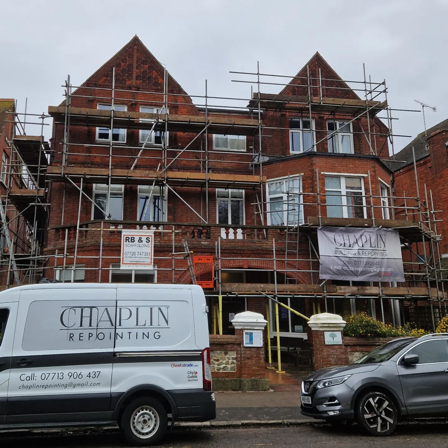 Chaplin Building & Repointing van parked outside a three-storey Victorian building on scaffold